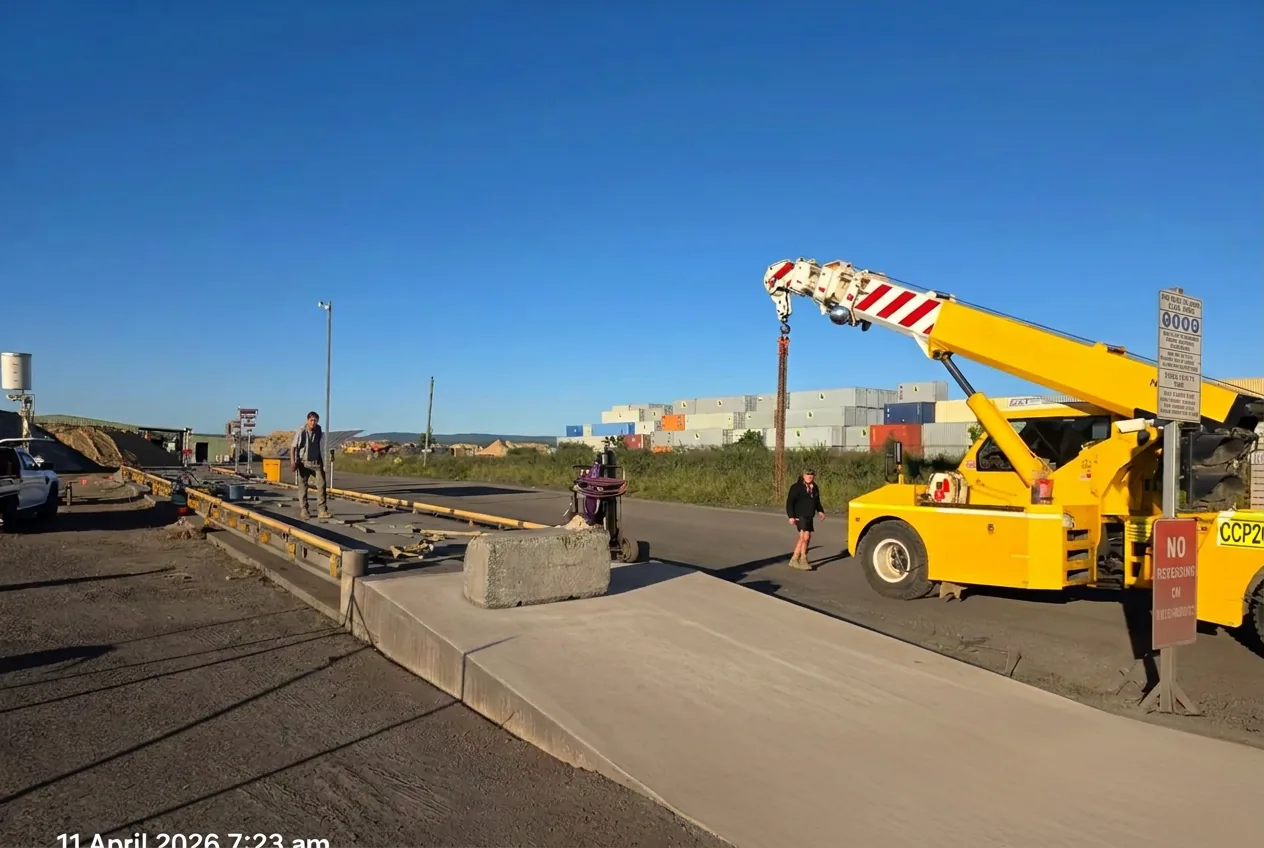 Crane lifting a 16.5-metre weighbridge deck module during the relocation