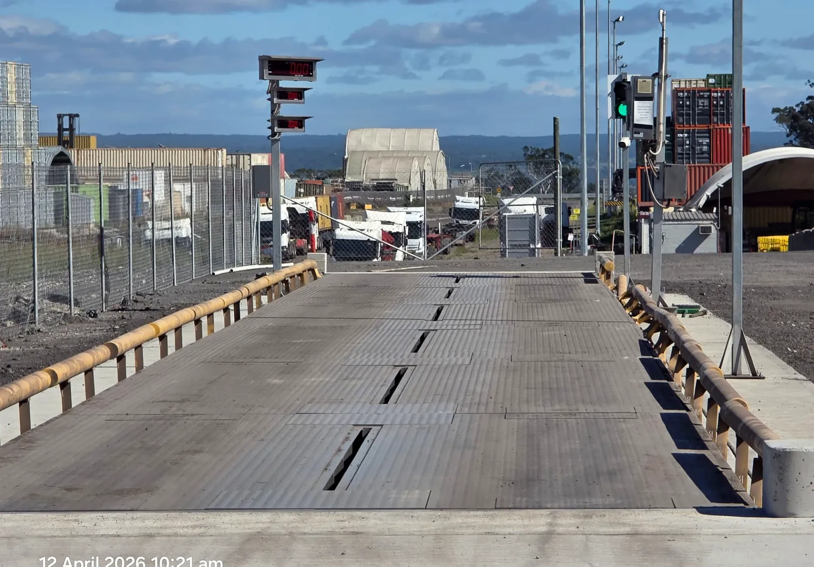Completed 33-metre multi-deck weighbridge with kerbing, guardrails and indicators